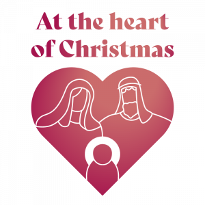 At the heart of Christmas logo with a silhouette of the holy family inside a pink heart