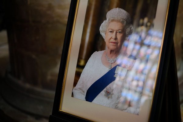 A framed photograph of the Late Queen